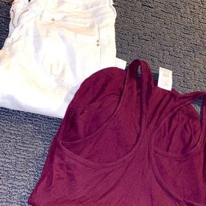 White shorts with a pink maroon top